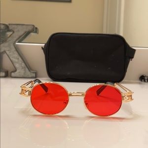 Red rounded glasses